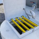 Trappe PRV sur dalle installée en extérieur