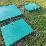 Trappes PRV vertes fermées sur une dalle en extérieur